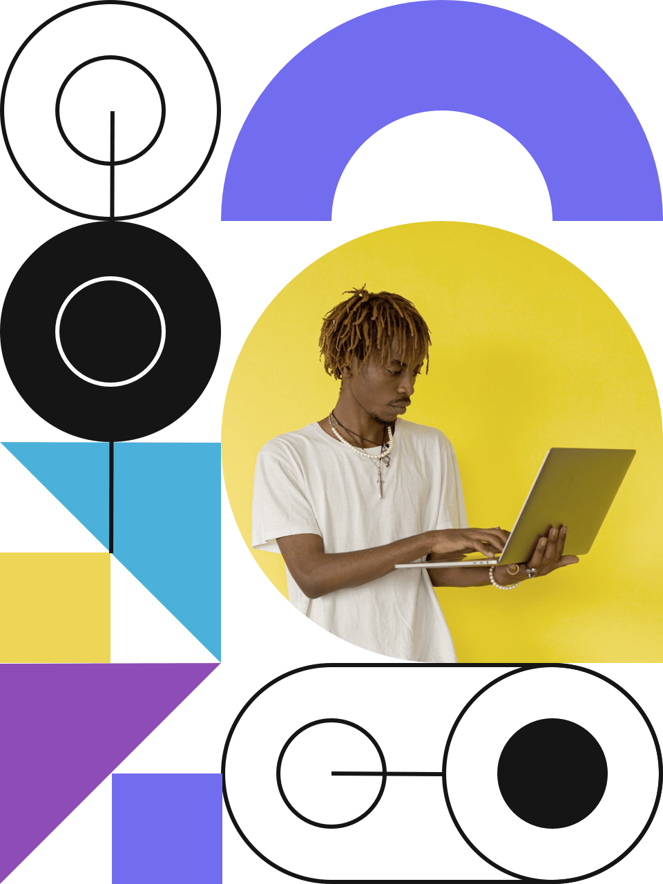 a male holding a laptop